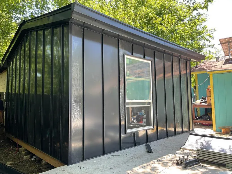 Black standing seam metal wall panels for Metal Roof Installation in West View